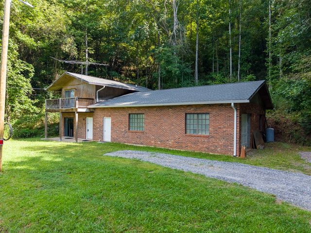 Home, garage wing and driveway