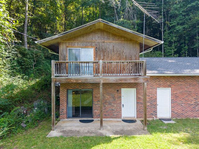 Upper deck and lower patio on the front of the home