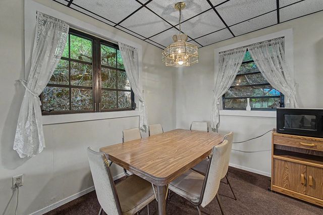 Dining area with a chandelier