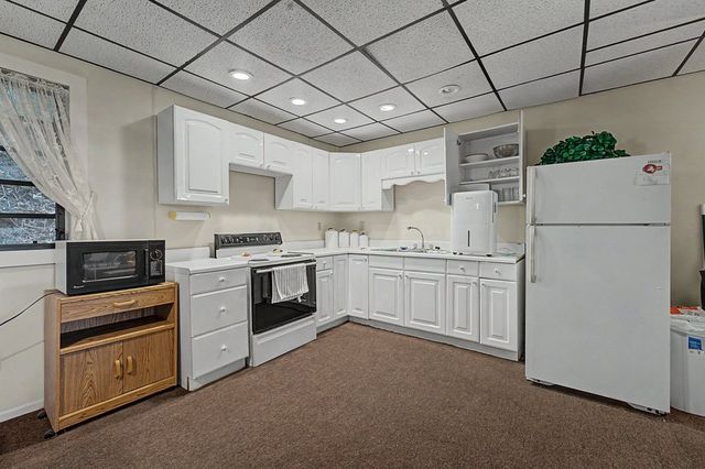 Kitchen with white cabinets