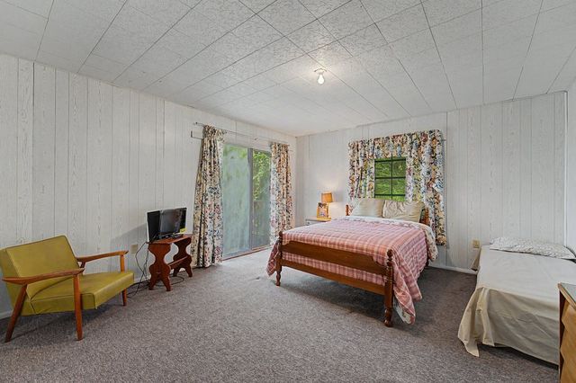 Bedroom with a sliding door