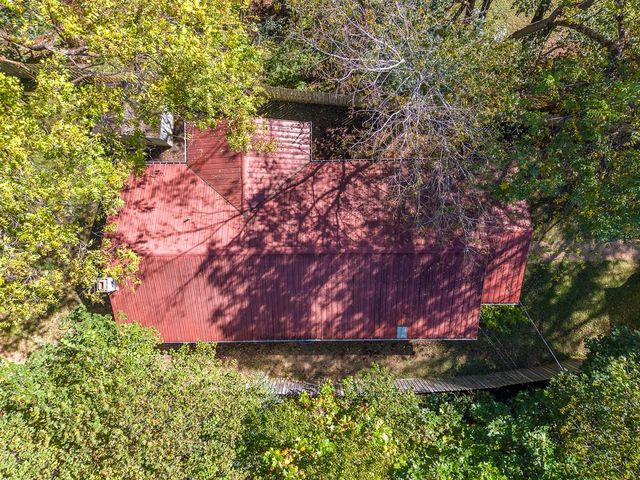 Aerial view of the red metal roof